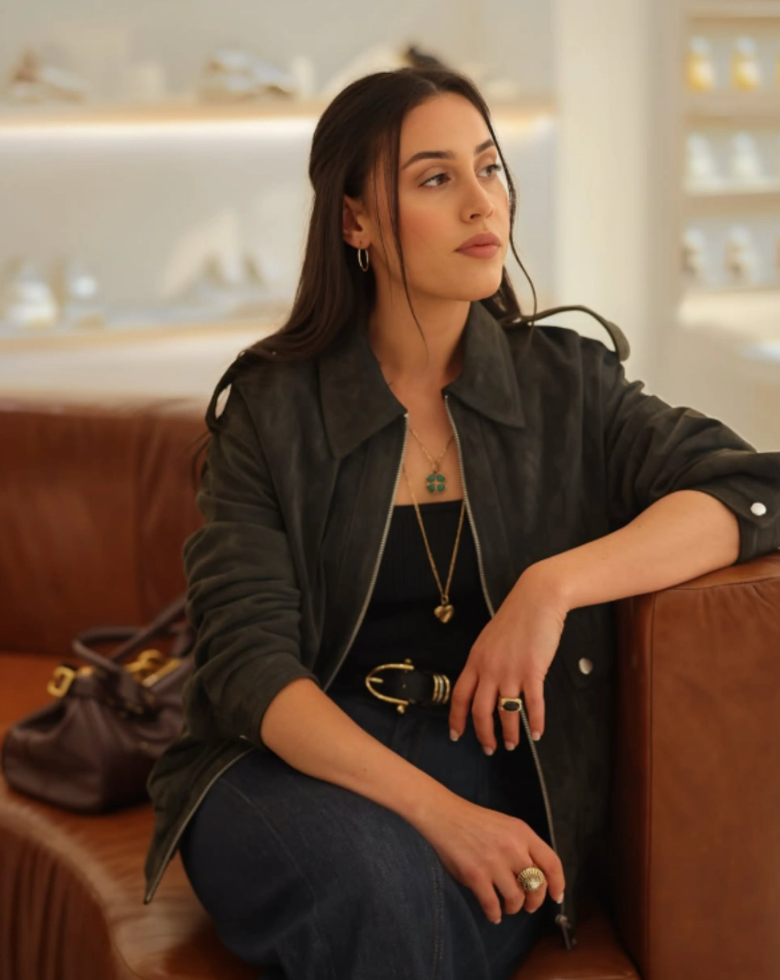 Dyala Pritchard seated in a softly lit interior.